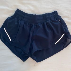 True Navy blue hottie hot shorts. Size 4 2.5”. Perfect condition!! Low rise